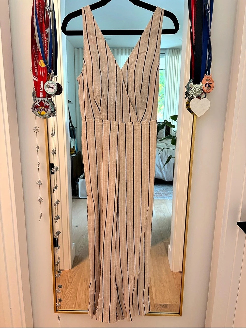 Women’s beige striped linen jumpsuit